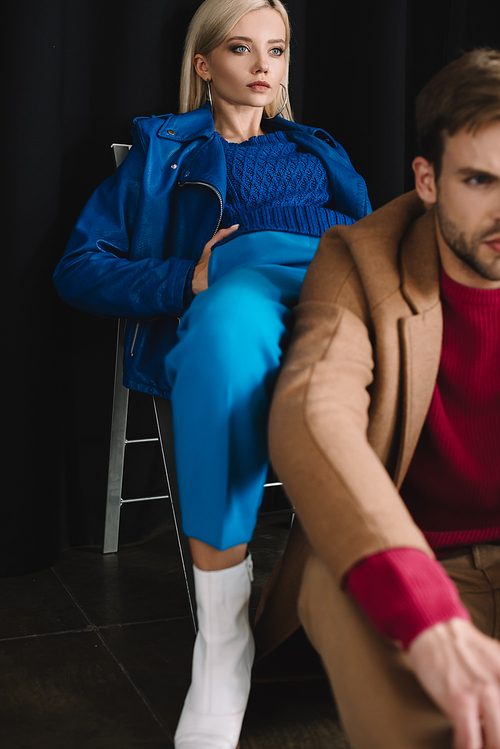 partial view of stylish woman and man in autumn outfits