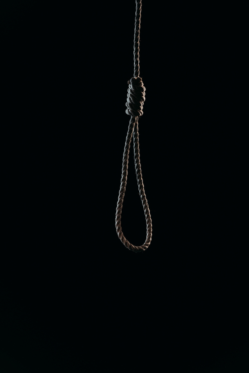 hanging rope noose isolated on black, suicide prevention concept