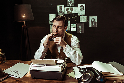 Detective in white shirt lighting cigar at table in office