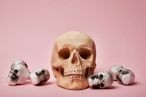 spooky skulls on pink background, Halloween decoration