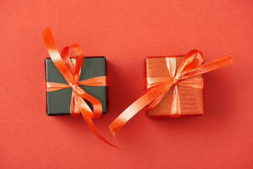 top view of gift boxes on red background