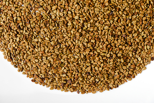 close up view of natural fenugreek on white background