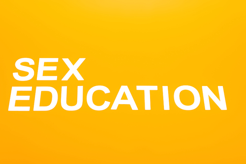 top view of sex education lettering isolated on orange