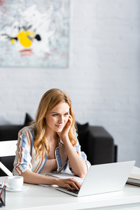 Selective focus of concentrated woman during working day
