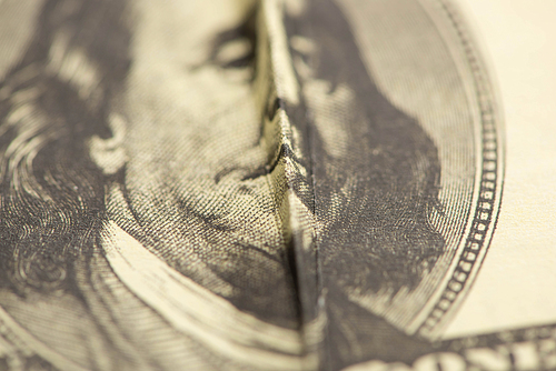 selective focus of crumpled dollar banknote