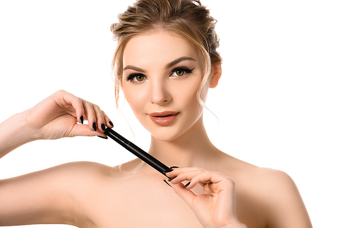 naked beautiful blonde woman with makeup and black nails holding mascara isolated on white