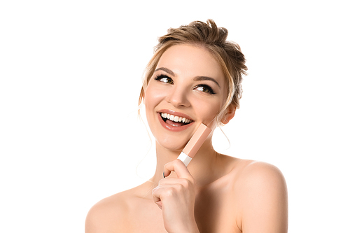 smiling naked beautiful blonde woman with makeup and black nails holding beige lip gloss isolated on white