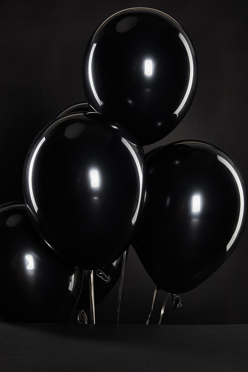 black balloons isolated on black, black Friday concept