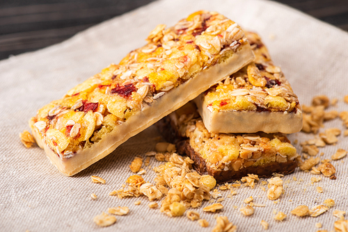 closeup of delicious muesli bars on napkin