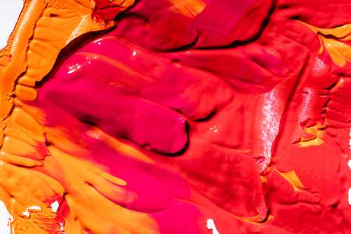 top view of red, orange and pink abstract background