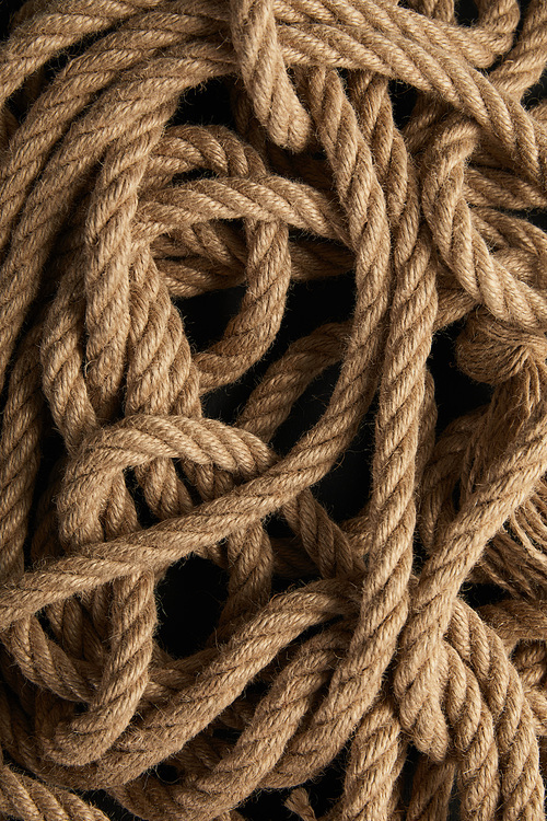 top view of rope on black background