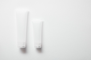 empty cream tubes for hand cream on white