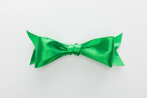 top view of satin green bow isolated on white