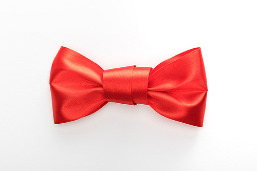 top view of red decorative satin bow isolated on white