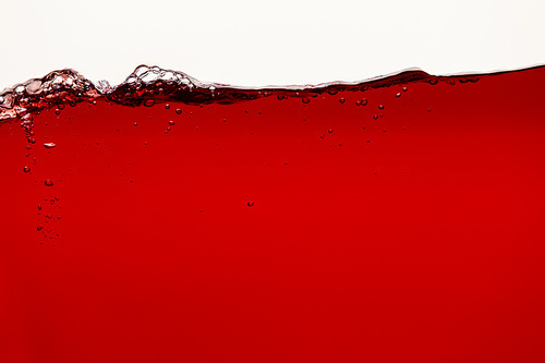 ripple red bright liquid with bubbles isolated on white