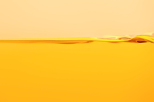 calm yellow bright liquid isolated on yellow