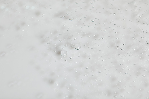clear transparent water drops on white background