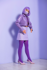young woman dressed in doll style in medical mask on violet colorful background