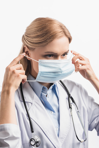 nurse in white coat wearing medical mask isolated on white
