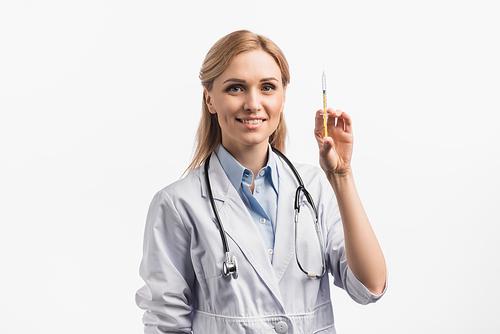 happy nurse in white coat holding syringe with vaccine isolated on white