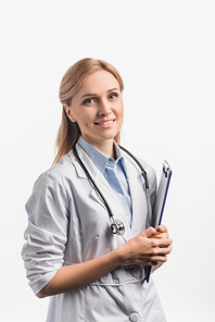 happy nurse in white coat holding clipboard isolated on white