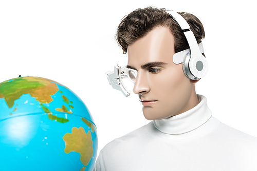 Cyborg in headphones and digital eye lens looking at globe on blurred foreground isolated on white