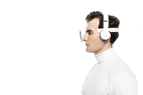 Cyborg in headphones and digital eye lens looking away isolated on white