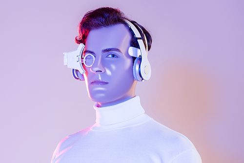 Cyborg man in headphones and digital eye lens  on purple background