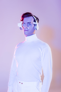 Cyborg in white clothes and headphones  on purple background
