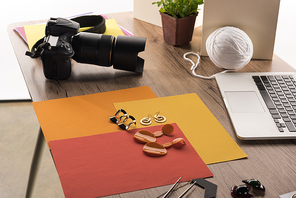 composition with accessories for photo shooting with camera and laptop