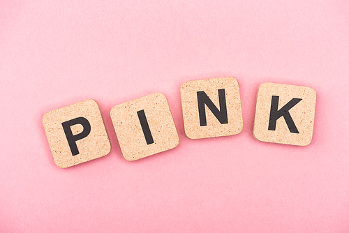 top view of word pink on cubes