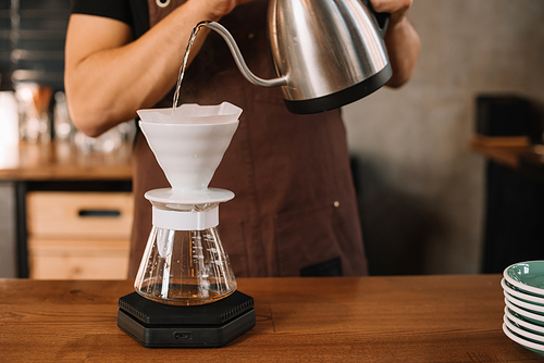 cropped view of barista making filtered coffee