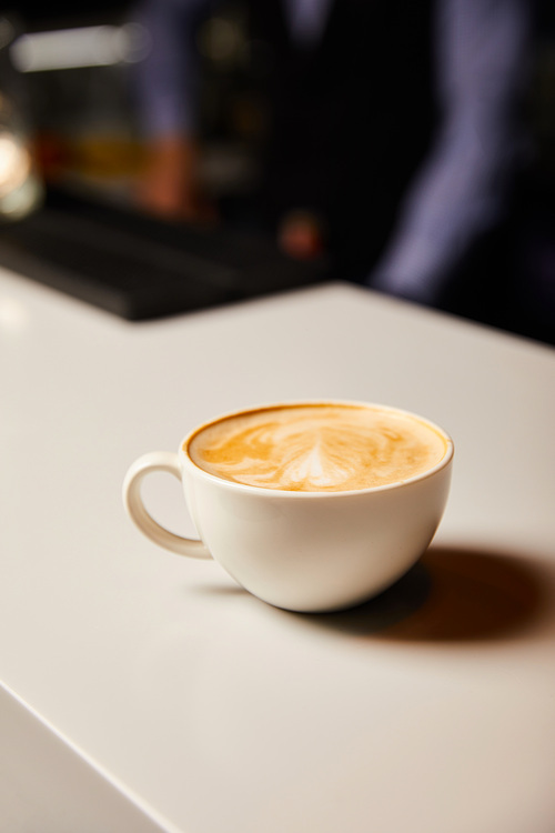 hot and tasty cappuccino in white cup