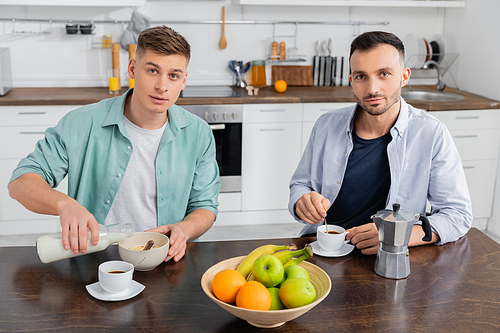 same sex couple  during breakfast