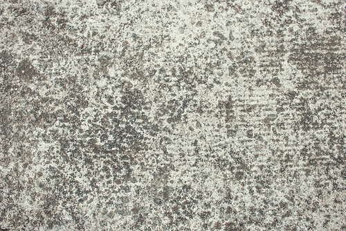 background with unpolished, grey granite, top view