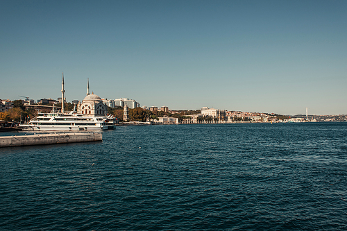 view of seafront with moored ships in Istanbul, Turkey