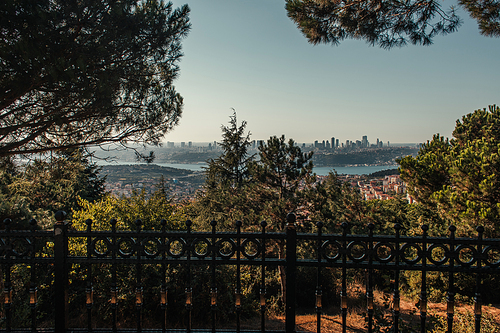 fence, green trees, and city view with Bosphorus strait