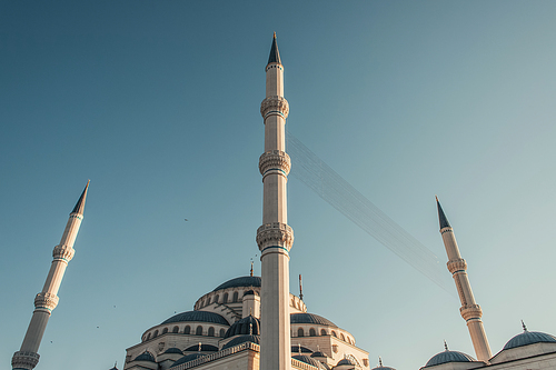 blue, cloudless sky above minarets of Mihrimah Sultan Mosque, Istanbul, Turkey