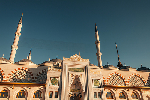 front facade of Mihrimah Sultan Mosque against cloudless sky, Istanbul, Turkey