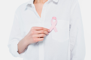 Cropped view of woman with breast cancer awareness ribbon isolated on white