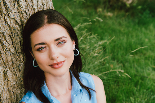 beautiful woman smiling while  outside