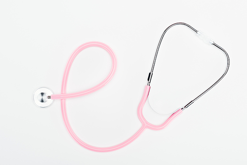 top view of pink stethoscope on white background
