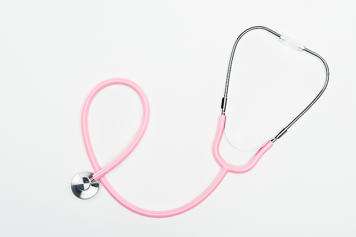 top view of stethoscope on white background, breast cancer concept