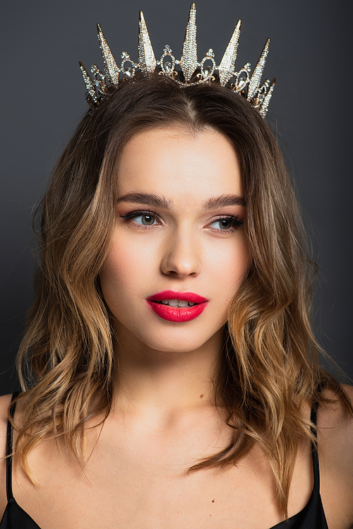 young woman in silver tiara with diamonds on grey
