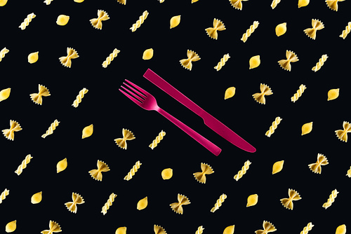 flat lay of different kinds of pasta with plastic pink fork and knife in middle isolated on black