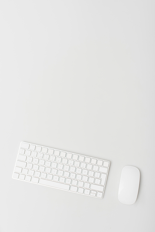 top view of computer mouse and keyboard isolated on white