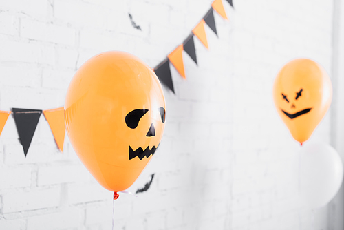 spooky orange balloons on halloween party
