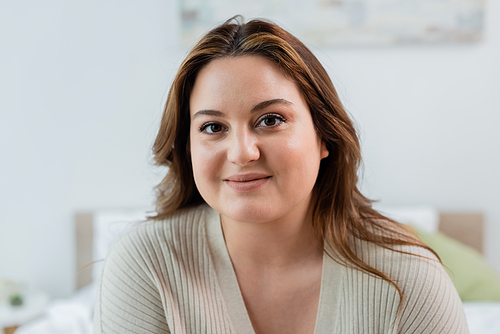 Pretty brunette woman with overweight  at home