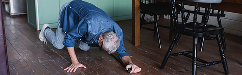 Sick man with crutch falling in floor at home, banner