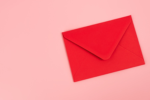 top view of red envelope isolated on pink